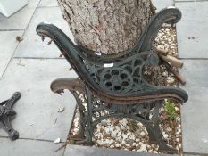 A pair of cast iron bench ends