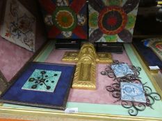 Various framed plaques and tiles some depicting religious icons