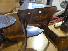 A mahogany envelope table