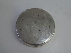 A decorative sterling silver compact mirror decorated with pretty stars. A decorative, ornate piece