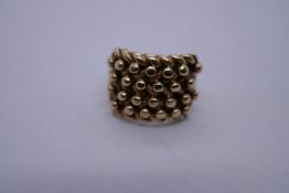 9ct yellow gold keeper ring, marked 375, size  W, approx 13.4g