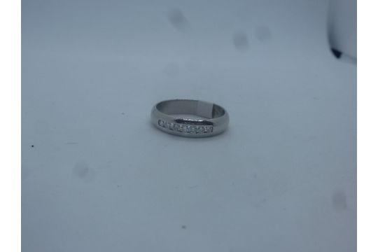 Platinum band ring with channel set brilliant cut diamonds, approx 6.5g, marked 950 - Image 2 of 2