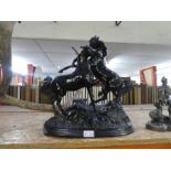 Cast mixed alloy figure depicting horses