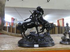 Cast mixed alloy figure depicting horses