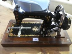 Vintage hand cranked 'Harris No 1 H' sewing machine