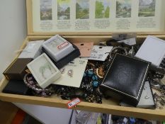 A mixed box of jewellery including costume silver, jade, watches, etc