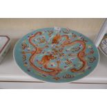 A Chinese turquoise ground charger decorated dragons, 36.5cms