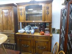 Early 20th century oak sideboard having a raised back with central glazed door 130cm wide