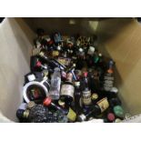 A box full of miniature spirits, including Scotch, etc