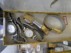 A collection of 4 ladies watches including a Rotary and a Tissot watch