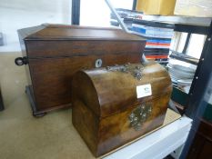 A Victorian Rosewood tea caddy on bun feet and a burr walnut dome topped box