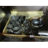 A vintage case of tankards, brass dish teapot, etc