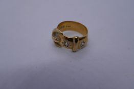 18ct yellow gold buckle ring inset with 2 sunburst diamonds, marked 18ct size N/o, 8.6g approx