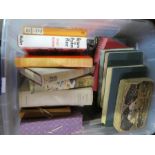 A small box of vintage hardback books, novels and travelling