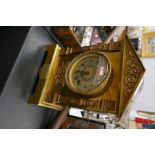 A French style brass mantel clock by the Insonia clock company, New York with a striking 8 day movem