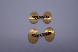 Pair of 9ct yellow gold machine decorated cufflinks, marked 375, 4.6g approx