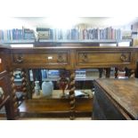 Reproduction oak side table having 2 drawers with shelf below and barley twist legs 156cm wide