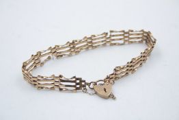 9ct 4 bar gate link bracelet with heart padlock 4.8g