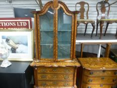 An antique Dutch marquetry display case having a pair of doors and 4 graduated drawers to the base 8
