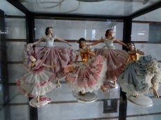 Selection of Capodimonte figurines wearing lace effect costumes