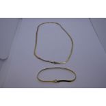 9ct yellow gold fine flat necklace and matching bracelet set, both marked 375, 5.8g