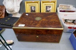 An antique burr walnut and brass inlaid humidor with bramar lock and various cigars