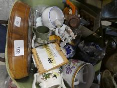 A basket of mixed china and collectables to incl. wooden games, ornaments and glasses