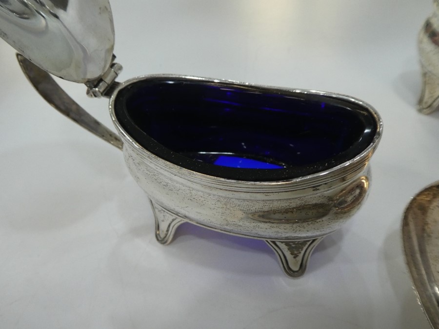 A silver lot to include Salts with Bristol blue glass insert, salt and pepper, serving spoons and co - Image 6 of 7