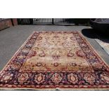 An early 20th century large carpet, blue bordered with floral design 423 x298cm