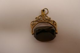 9ct Gold smoky quartz spinner fob 6.2g