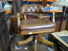 Revolving Captain's chair leather style button back and seat design