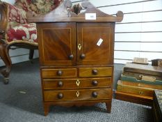A miniature antique mahogany cupboards having fitted interior with drawers below 34cm Wide