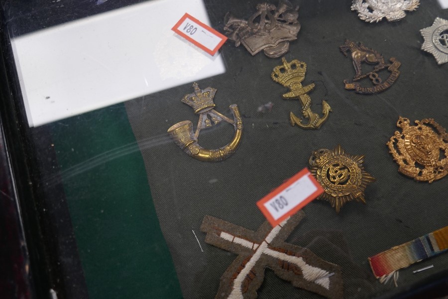 A small glazed display case containing military badges and similar. - Image 3 of 3