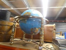 A globe on a decretive stand