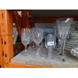 Selection of cut glasses including Waterford champagne flutes