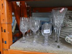Selection of cut glasses including Waterford champagne flutes