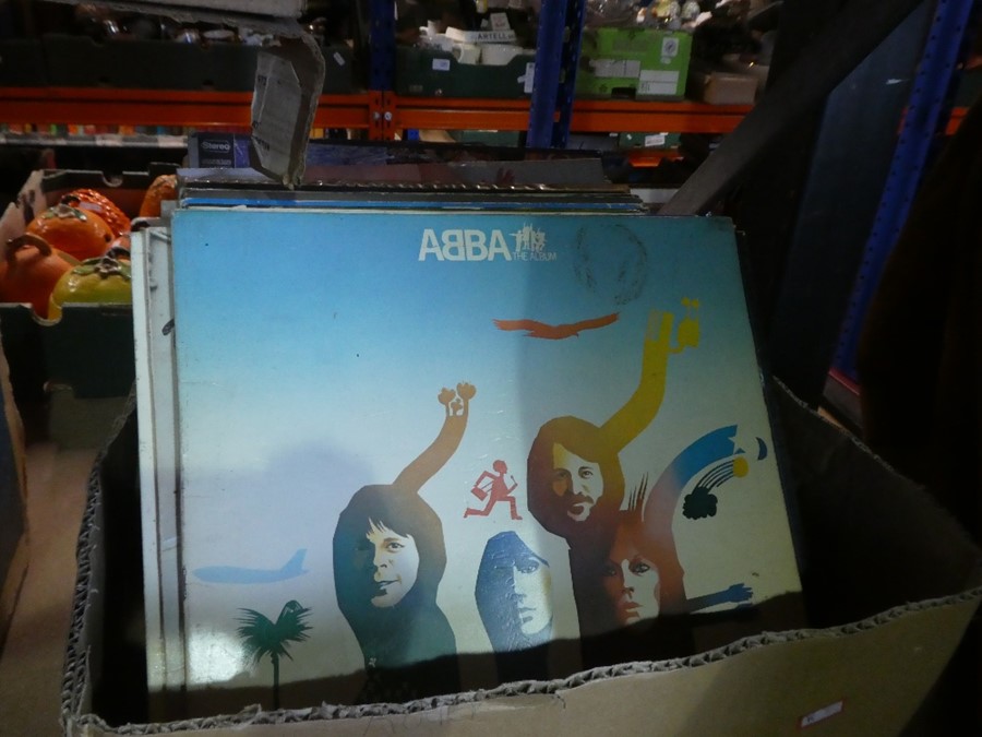 A box of LP records to include Abba, Eagles, Simon & Garfunkel, Dire Straits