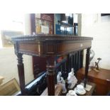 A Victorian rosewood foldover card table on fluted legs, 92cms