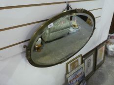 Oval brass mantle mirror