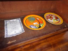 Two Wedgwood limited edition Clarice Cliff plates, one with certificate