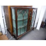 Early 20th century mahogany bow fronted display cabinet having laquered panel 121cm