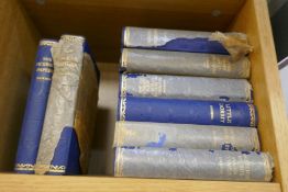 Eight early 20th century Charles Dickens novels with blue covers