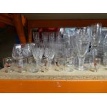 A large selection of glassware, to include glasses, vases, dressing table set