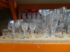 A large selection of glassware, to include glasses, vases, dressing table set
