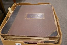 A Victorian scrapbook album and other in a tray