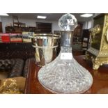 A Waterford crystal decanter having silver hallmarked collar, and a plated ice bucket