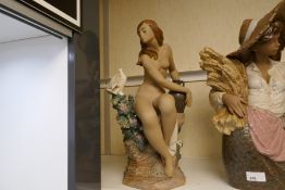 A Lladro Gres figure of seated nude with dove, No 1371, - chip to wing