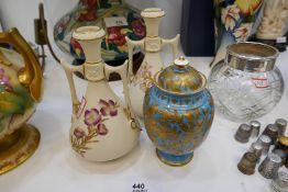 Pair of late 19th Century Royal Worcester vases decorated with flowers, 15cm and a Derby vase and co