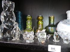 A pair of LOETZ style vases having silver rims, Swarovski animals and other glassware