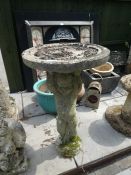 Stone effect bird bath with cupid design column and a selection of glazed pots and sundries